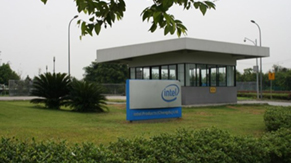 Green field in front of site entrance